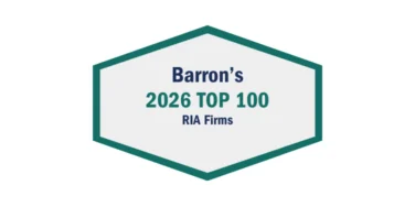 Hexagonal badge displaying “Barron’s 2026 Top 100 RIA Firms” in blue and green text on a white background with a green border.
